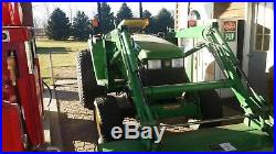 4710 John Deere utility tractor Green with 6' back blade, 6' finish mower 2004