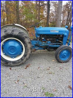Ford 2000 late 60s, with blade, finish mower, & older loader. Runs great