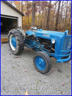 Ford 2000 late 60s, with blade, finish mower, & older loader. Runs great