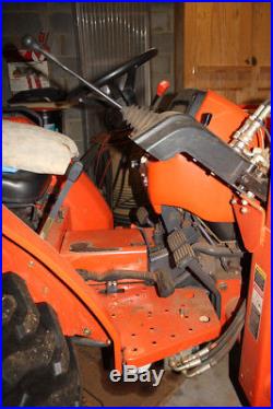 Kubota L2800 tractor with end loader, Bushhog finish mower, box blade