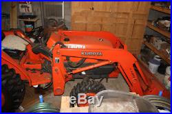 Kubota L2800 tractor with end loader, finish mower, box blade